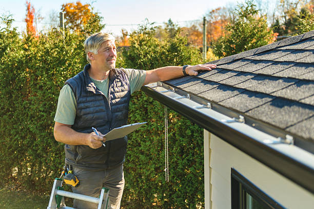 Professional Roofing technician working in Hughson, CA